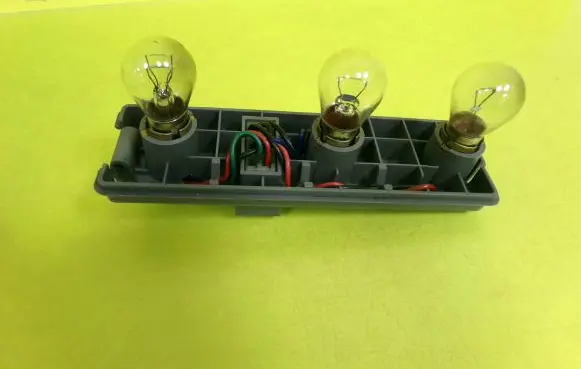 KIA Sportage Tail light bulb cover holder