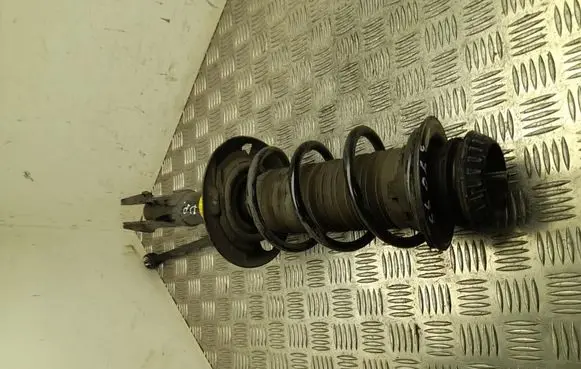 Toyota Yaris XP210 Front shock absorber with coil spring 48510K0090