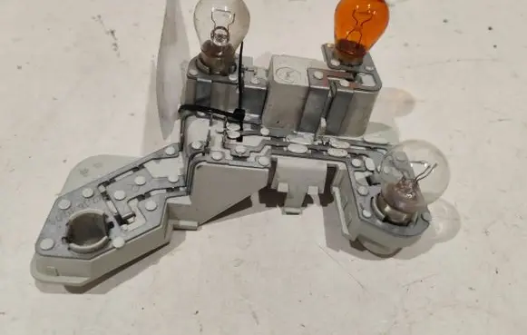 Volvo V50 Tail light bulb cover holder 27168008
