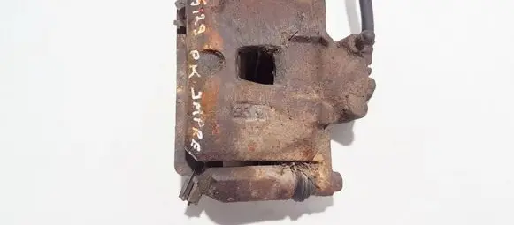Subaru Impreza I Front brake caliper