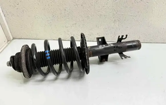 Front shock absorber with coil spring