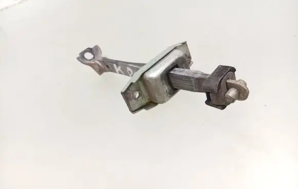 Front door check strap stopper