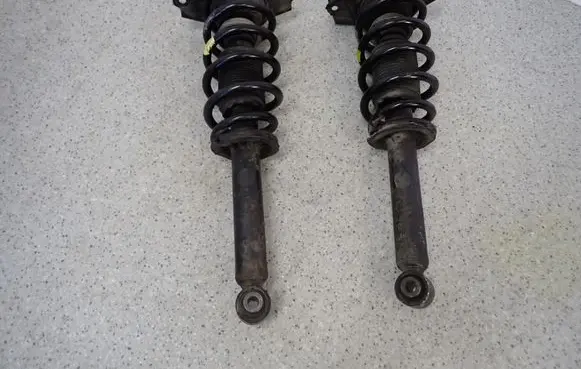Nissan Primera Front shock absorber with coil spring