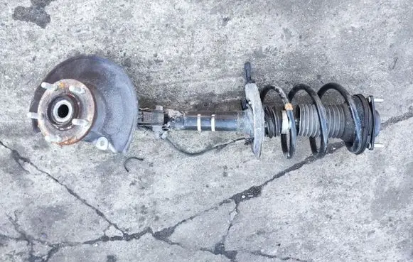 Mitsubishi Outlander Front shock absorber with coil spring 4060A564