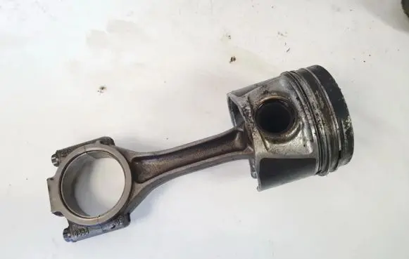 Piston with connecting rod