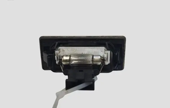 Volkswagen PASSAT B6 Number plate light 8T0943021