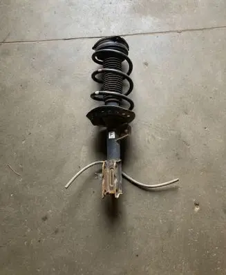Nissan X-Trail T31 Front shock absorber with coil spring 54303JG72A 824903003779