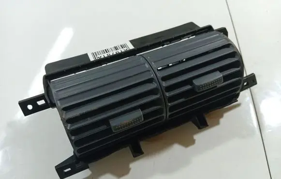 Dash center air vent grill