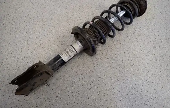 Mitsubishi Colt Front shock absorber with coil spring 