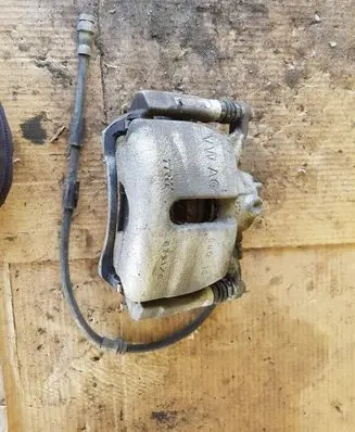 Volkswagen Golf VII Front brake caliper 5521C