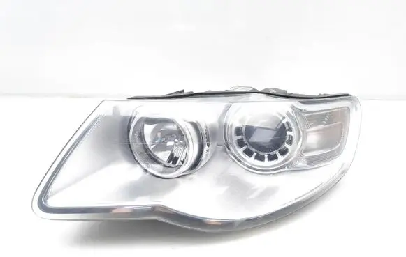 Volkswagen Touareg I Headlight/headlamp 7L6941031A 1LL247032-03
