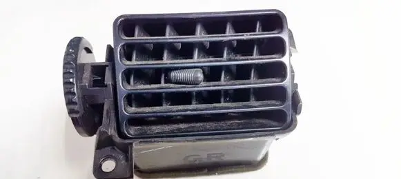 Mazda 323 Dash center air vent grill bg1ngm731