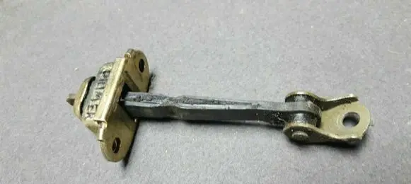 Nissan Primera Front door check strap stopper 12785626