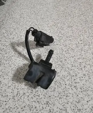 Windshield washer spray nozzle