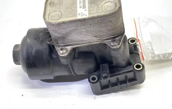 Volkswagen Golf VI Oil filter mounting bracket 03L117021C