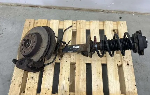 Volkswagen Golf V Front shock absorber with coil spring MMAUTKO18059