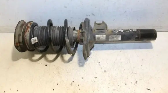 Volkswagen Golf VII Front shock absorber with coil spring 5Q0413023EQ
