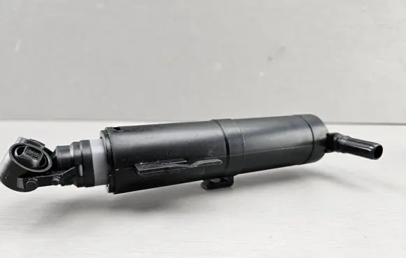 BMW X1 E84 Headlight washer spray nozzle 7321891 61677321891