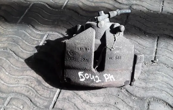 Volkswagen PASSAT B7 Front brake caliper NOCODE