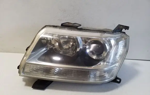 Suzuki Grand Vitara II Headlight/headlamp 10059079