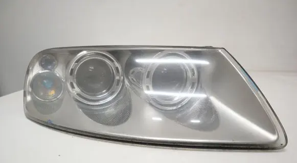 Volkswagen Touareg I Headlight/headlamp 89307861