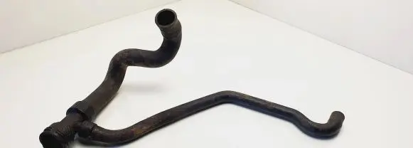 Volkswagen PASSAT B5 Engine coolant pipe/hose 8D0121055F