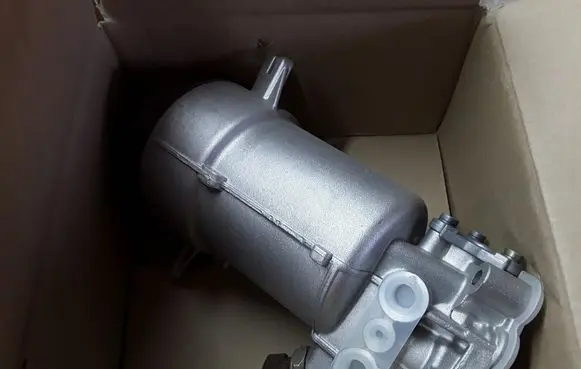 Opel Omega B2 Oil filter mounting bracket 90542399