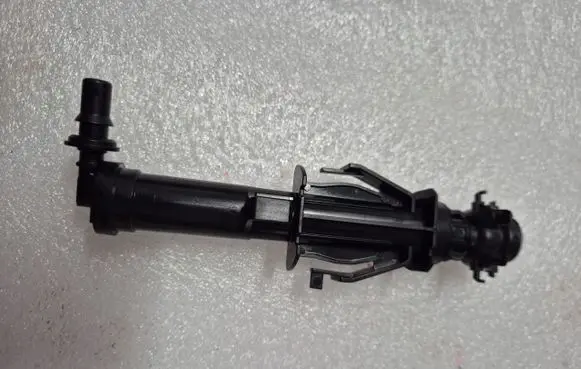 Headlight washer spray nozzle