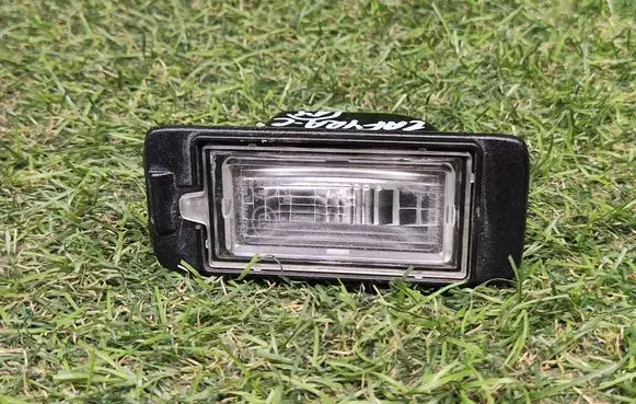 Opel Zafira C Number plate light 13578958
