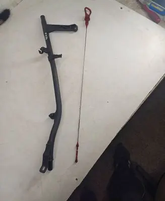 Oil level dip stick