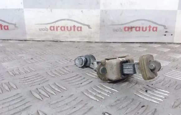 Front door check strap stopper