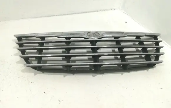 Chrysler Voyager Front bumper upper radiator grill 04857804AB