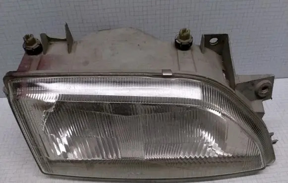 Ford Escort Headlight/headlamp 91AG13K060AA