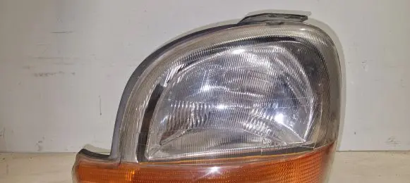 Renault Kangoo I Headlight/headlamp 7700308624