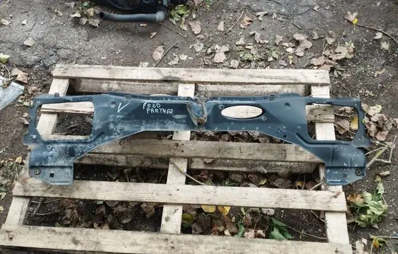 Radiator support slam panel