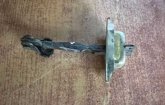 Toyota Yaris Front door check strap stopper 