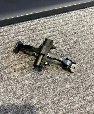 Rear door check strap stopper