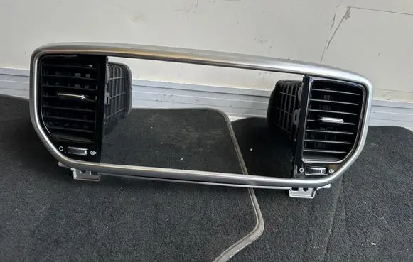 KIA Sportage Dash center air vent grill 97410F1AA0