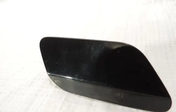 Headlight washer spray nozzle cap/cover