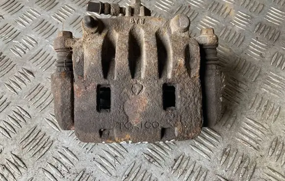 Subaru Impreza III Front brake caliper