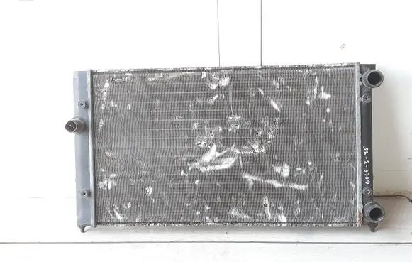Volkswagen Golf III Coolant radiator 1H0121253R