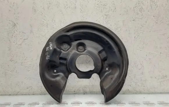 Volkswagen PASSAT B6 Rear brake disc plate dust cover 5N0615612C