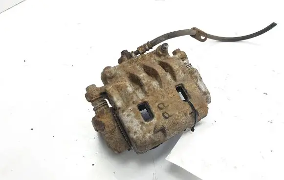 Subaru Impreza II Front brake caliper