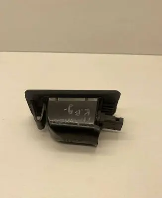 Chevrolet Malibu Number plate light 13590043
