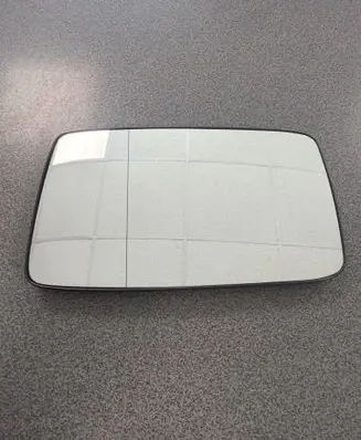 Volkswagen Golf III Wing mirror glass 1H1857521