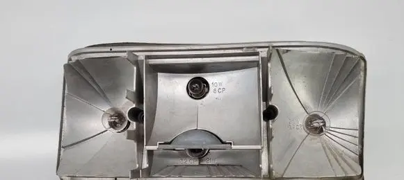 Tail light bulb cover holder