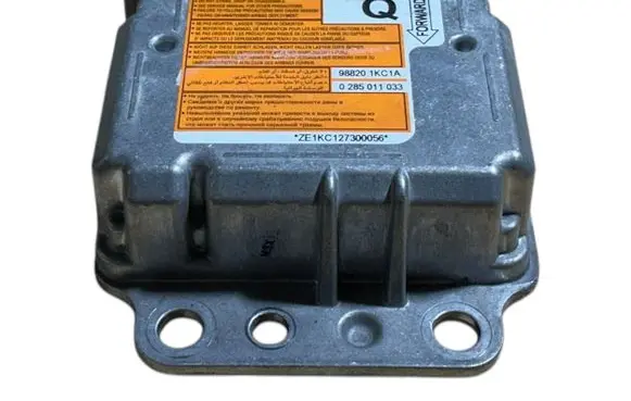 Nissan Juke I F15 Airbag control unit/module 988201KC1A 0285011033
