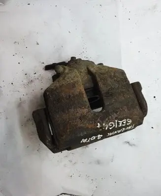 Volkswagen Touran I Front brake caliper