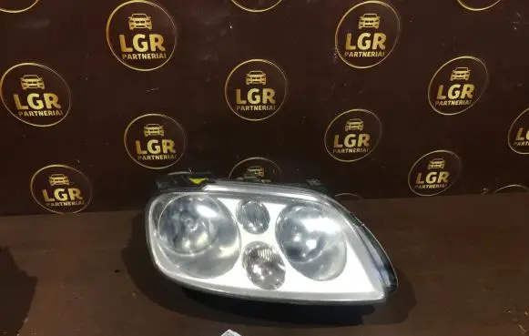 Volkswagen Touran I Headlight/headlamp 1305235778 031205202