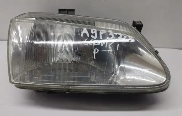 Renault Scenic I Headlight/headlamp 7701672735